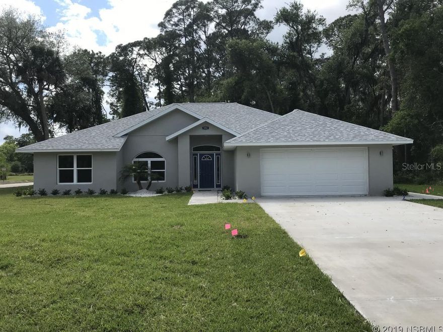 THIS BEAUTIFUL BRAND NEW HOME IS A 3/2 WITH VAULTED CEILINGS, AN OPEN FLOOR PLAN, GRANITE COUNTER TOPS, STAINLESS APPLIANCES, A LARGE LANAI AND A 2 CAR GARAGE ON A LARGE CORNER LOT. THE FLOORS ARE TILE AND CARPET IN THE BEDROOMS. ALL BEAUTIFULLY PAINTED. CLOSE TO BEACH AND SHOPPING. FLOOD INSURANCE IS NOT REQUIRED ;Water: City