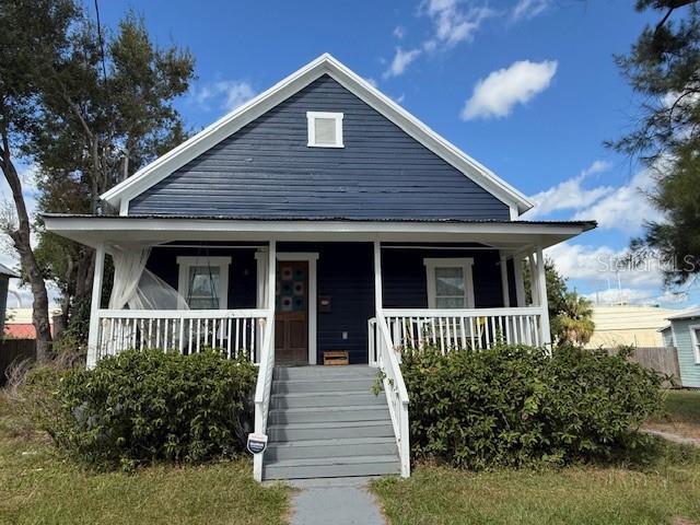 2020 remodeled picturesque historic bungalow. Private fenced back yard, established landscaping, and large front porch. The interior features a bright and open floor plan with premium bamboo floors throughout the main living areas, plenty of natural light and 12ft ceilings. The kitchen has stainless steel appliances, tile backsplash, and beautiful granite countertops. The master suite features an attached bathroom updated with designer tile and a double vanity and subway tile shower, also access to the large walk-in closet. Home is walking distance to downtown Ybor City