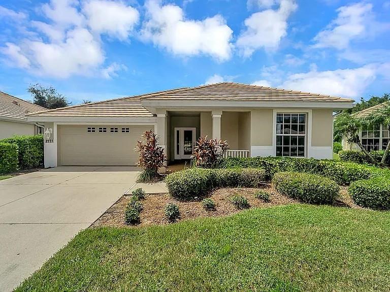 Photo of 2771 Whispering Pine Lane, North Port, FL 34287 (MLS # TB8520242)