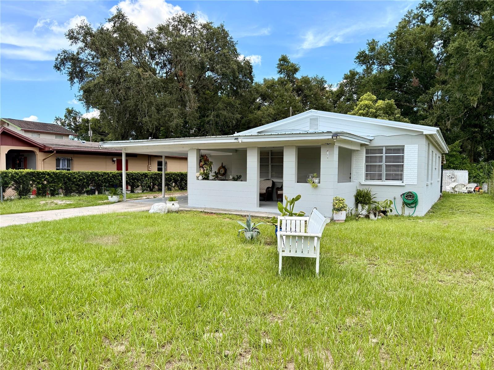 Totally Renovated 3-Bedroom Home in Lakeland! This beautifully updated 3-bedroom, 1-bath home is move-in ready and full of modern upgrades. Featuring a brand-new metal roof, new AC system, and ceramic tile flooring throughout, every corner of this home has been refreshed. The kitchen boasts new cabinetry, updated appliances, and a clean, functional layout perfect for everyday living.Enjoy the outdoors with a fully fenced yard, a charming front porch sitting area, and a spacious covered lanai out back—ideal for relaxing or entertaining. A convenient carport keeps your vehicle protected, and there’s a storage shed for all your tools and extras. Don’t miss your chance to own this renovated gem in the heart of Lakeland—schedule your showing today!