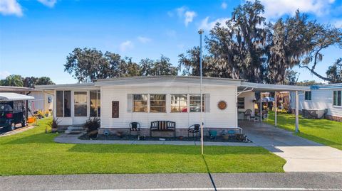 Photo of 313 Palo Verde Drive, Leesburg, FL 34748 (MLS # O6380700)