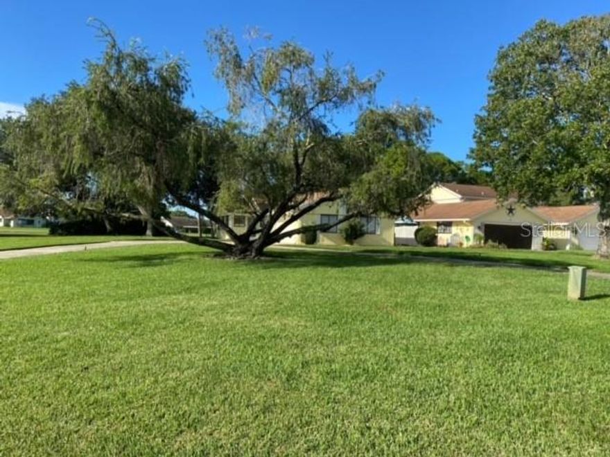 In the Fairgreen/Hidden Lakes  golf community resides this lovely home on extra large corner lot with large circle driveway, there is a park across the street and golf course on two sides. Home is right on the golf course Hole number 3 of Hidden Lakes golf course enjoy this lovely 2-bedroom, 2 bathroom home extra room that can be 3rd bedroom, office, playroom etc -Home has just been renovated with new roof 2022, new HVAC DEC 2021, exterior paint, master bathroom shower remodel, has stainless steel appliances, Large 2 car garage and great layout! Also conveniently located close to everything in New Smyrna Beach and only 3.5 miles to the beach. 
Home is priced at appraised value. Owner is a licensed Florida Realtor
Low, annual HOA dues provides you with complete operation and maintenance of sprinkler system, and water to it, as well as termite bond and separate, (optional) Pool association gives access to heated community pool
Measurements presumed accurate but should be verified by buyer ;Water: City