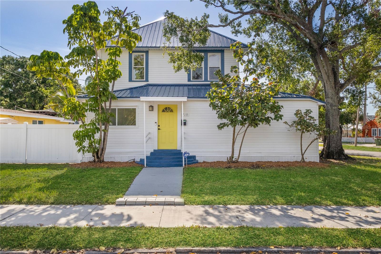 ***PRICE REDUCTION*** Charming 1920s Updated Historic Home – Step into timeless elegance with this beautifully updated 1920s residence, ideally situated on a coveted corner lot in the highly sought-after White Bear Park neighborhood—just a short walk from Pier 22 and the vibrant heart of downtown Bradenton. Framed by a stunning mature Banyan tree, this 4-bedroom, 2.5-bath home blends classic Florida charm with modern upgrades, including a brand-new metal roof (no insurance issues here), luxury plank flooring, fresh interior texture and paint, and stylish new baseboards. The kitchen features granite countertops and ample space for culinary creations, complemented by a dedicated laundry room for added convenience. A walk-up attic offers generous storage, and the fully fenced backyard creates a private oasis for entertaining, relaxing, or letting pets roam. With Bradenton’s rich architectural heritage and old Florida character on full display, this home is just a short drive to world-famous Anna Maria Island and within walking distance to restaurants, pubs, and everything else that defines the Florida lifestyle.