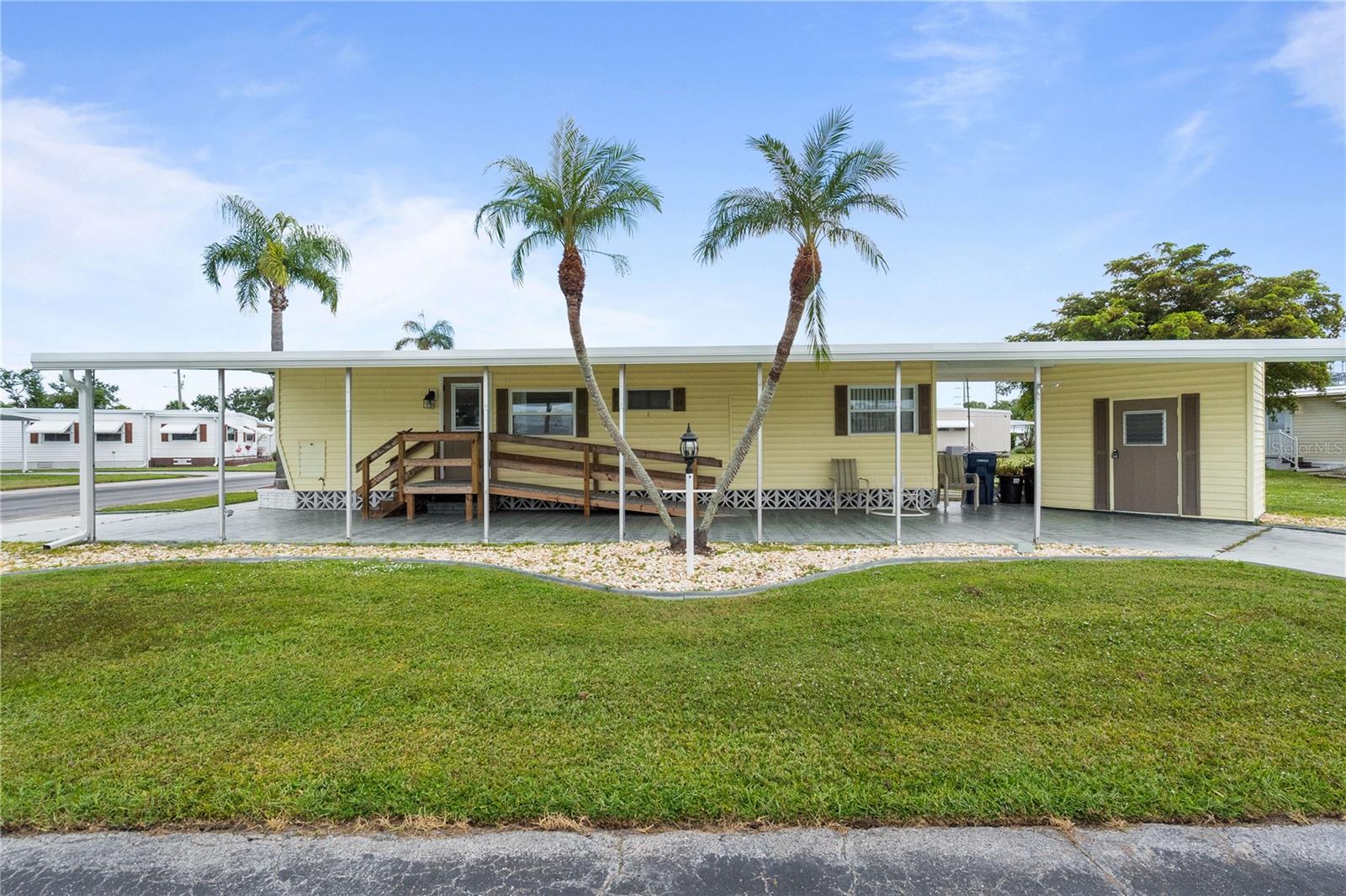Escape to a life of serenity and sunshine in this stunning 2-bed, 2-bath home, nestled within the tranquil Chateau Village, a land-owned, active 55+ adult community with low HOA fees! Imagine waking up and sitting on your charming composite front porch, perfect for sipping coffee and enjoying the warm breeze. With updated windows, modern finishes, and luxurious touches, this home feels like a brand-new retreat. Plus, the handicap ramp ensures safe and easy access for all.
But it's not just the home that's special - it's the community too! Enjoy amenities like a heated pool, shuffleboard, and on-site manager, as well as a range of activities and events designed for active adults. And with world-renowned beaches, cultural attractions, and outdoor recreation just a stone's throw away, you'll never be bored.
Surrounded by the beauty of Florida, you'll be living in paradise! With easy access to Tampa and Sarasota/Bradenton International airports, you'll be just a short hop away from your next adventure. And when you're not soaking up the sun on the beach, you can enjoy the rich cultural scene, with arts and entertainment options galore.
So, what are you waiting for? Contact your favorite Realtor today to schedule a viewing and make this beautiful home yours! Let's set sail for a life of ease and relaxation!