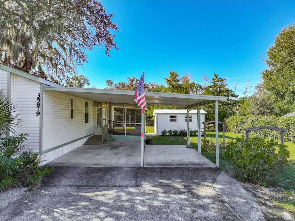 Photo of 35819 S Shelley Drive, Leesburg, FL 34788 (MLS # TB8448295)