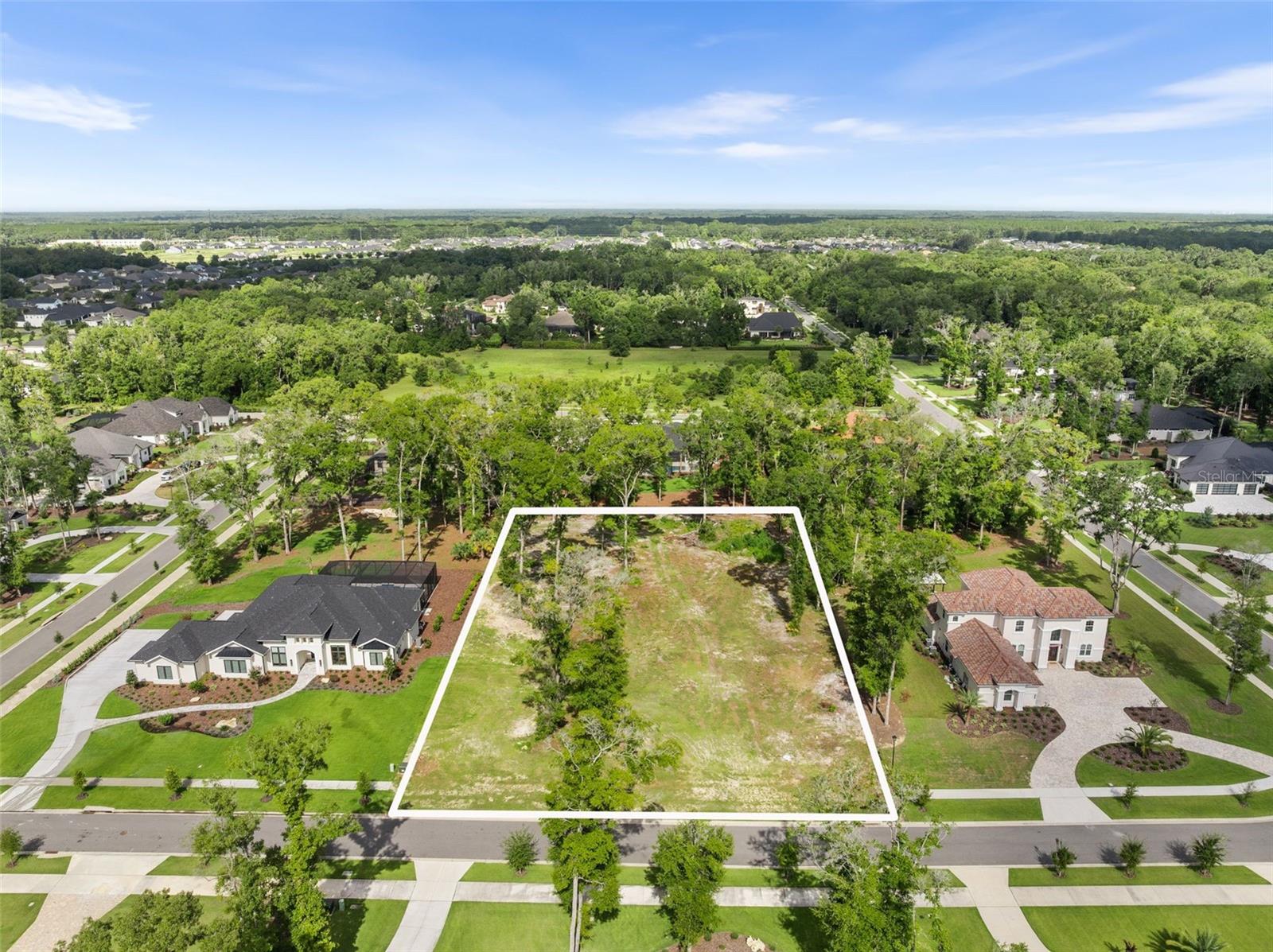 The LAST available 1-acre homesite in Oakmont’s highly desirable Estate section! This rare opportunity to build your dream home in one of Gainesville’s most sought-after communities won’t last long. This premium lot offers 150 feet of frontage and an east-facing orientation—perfect for enjoying peaceful sunset views from your back lanai
Design flexibility abounds with a minimum living space requirement of 3,800 sq ft, allowing you to create the ideal custom home to suit your lifestyle. Zoned for top-rated public schools—Chiles Elementary, Kanapaha Middle, and Buchholz High—with several esteemed private schools nearby.
Utilities include Clay Electric, GRU water and natural gas, reclaimed water, underground utilities, plus AT&T Fiber or Cox for high-speed internet.
Enjoy an unmatched amenity-rich lifestyle featuring: tennis, basketball, pickle ball courts, lap pool, splash pad, beach volleyball, a nature trail system, gopher tortoise preserve, and an interactive playground. The Residents Club offers a gym, veranda, indoor/outdoor entertaining space with a double-sided fireplace, TVs, and a catering-friendly half kitchen.
Oakmont isn't just a neighborhood—it's a lifestyle. Contact us today to schedule your private tour!