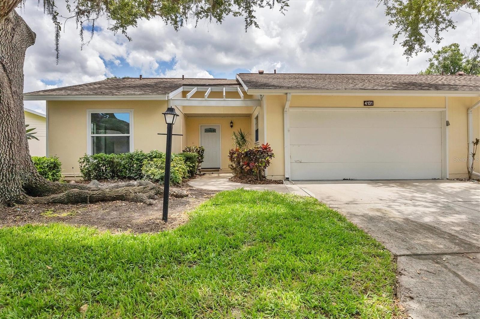 Discover your dream home in this stunning 2-bedroom, 2-bath villa with a convenient 2-car garage, all nestled within the highly desirable 55+ maintenance-free community of Oakhurst. This beautifully updated unit exudes modern elegance, featuring luxurious vinyl plank flooring throughout and brand-new tile flooring in the bathrooms. Step into a fully revamped kitchen that is a chef's delight, boasting sleek new cabinets with soft-close mechanisms, exquisite granite countertops, an undermount sink, stylish fixtures, and top-of-the-line appliances. The kitchen is also well-lit with newly recessed LED lights to create a perfect ambiance. Both bathrooms are designed for comfort and convenience, complete with new vanities, toilets, sinks, shower tile, and contemporary recessed LED lighting. The outdated popcorn ceiling has been replaced with a fresh, retextured finish, and the entire space has been meticulously primed and painted. Enjoy peace of mind with a new front door and lockset, alongside all-new electrical switches, outlets, and faceplates. Ample storage is available with new shelving in all closets and the kitchen pantry. The garage stands out with a new slab featuring rebar, effective bug treatment, and an attractive epoxy flake coating on the floor, adding both style and functionality. Freshly painted and impeccably maintained, this villa also features a new door from the kitchen to the garage and upgraded exterior stucco. You’ll appreciate the impact windows installed on most windows in 2015, with all windows recently sealed for enhanced efficiency. Plus, the air conditioning unit was replaced in June 2014, and the roof was replaced in 2011—reassuringly managed by the association, along with pest and termite treatments. The vibrant community offers an array of amenities, including a heated, screened pool, shuffleboard, and a clubhouse fully equipped with a kitchen, a library, a pool table, ping-pong tables, and restrooms. Best of all, cable and internet are included in the condominium fee, making this a truly exceptional place to call home. Don’t miss your chance to embrace a lifestyle of comfort and convenience in this remarkable villa! Owner is Motivated!