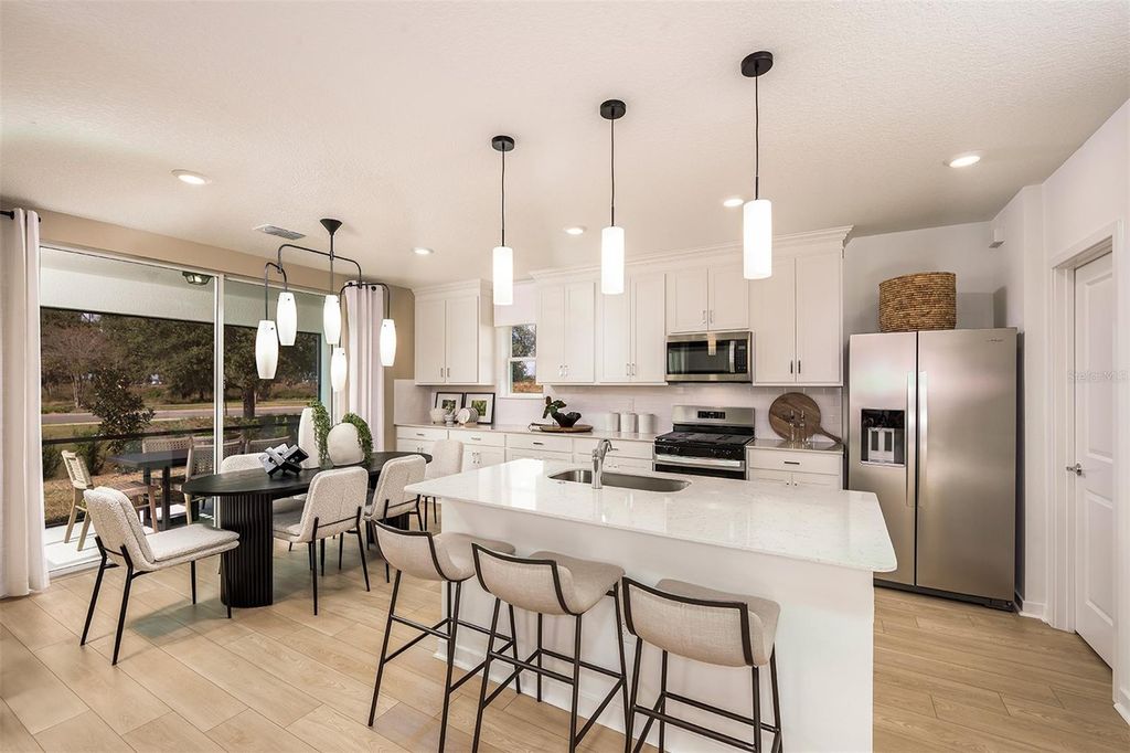 Photo of 9754 Crescent Moon Drive, Riverview, FL 33578 (MLS # TB8449450)