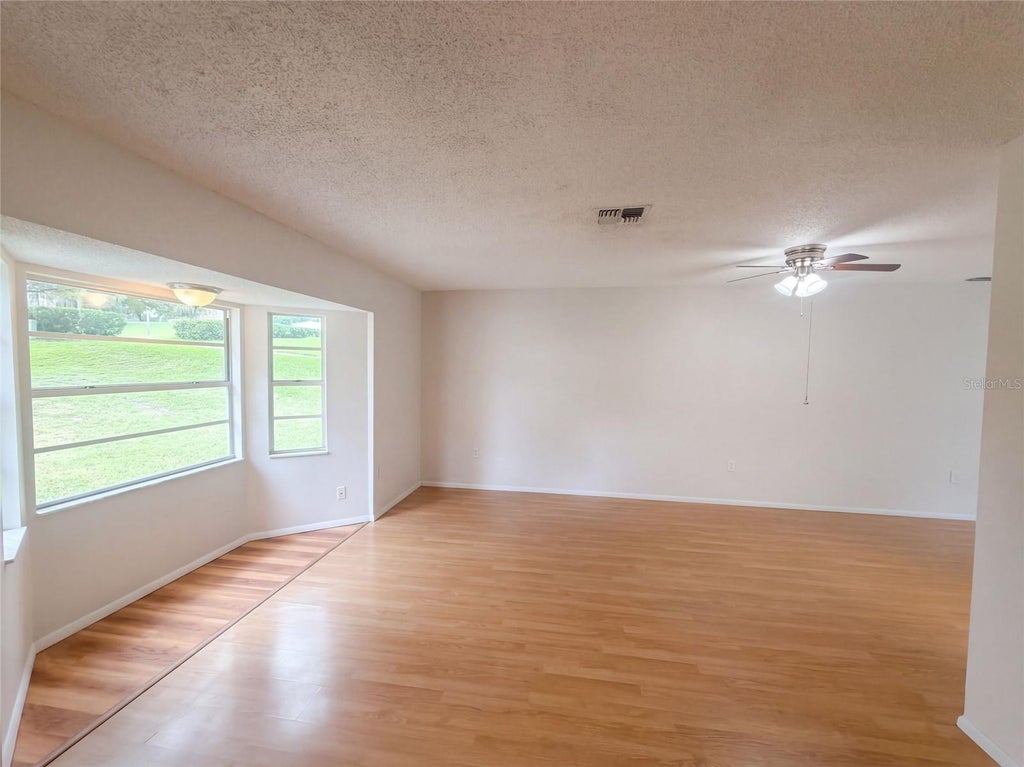 Photo of 12054 Joe Herrmann Drive, San Antonio, FL 33576 (MLS # O6448352)