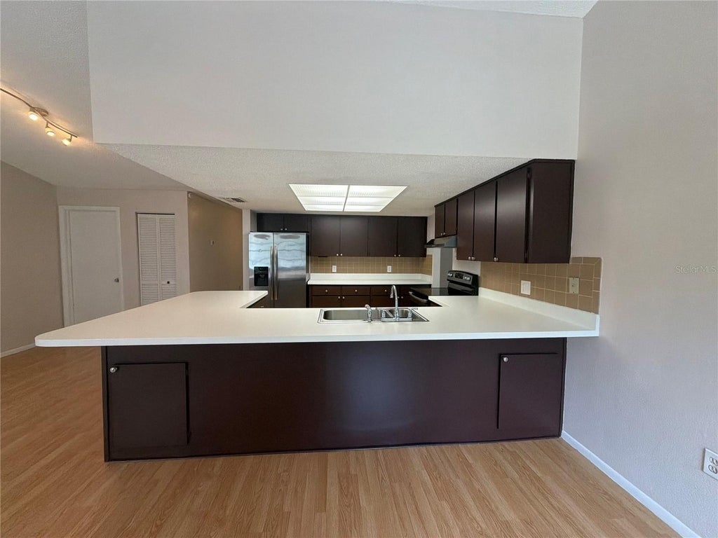 Photo of 12054 Joe Herrmann Drive, San Antonio, FL 33576 (MLS # O6448352)
