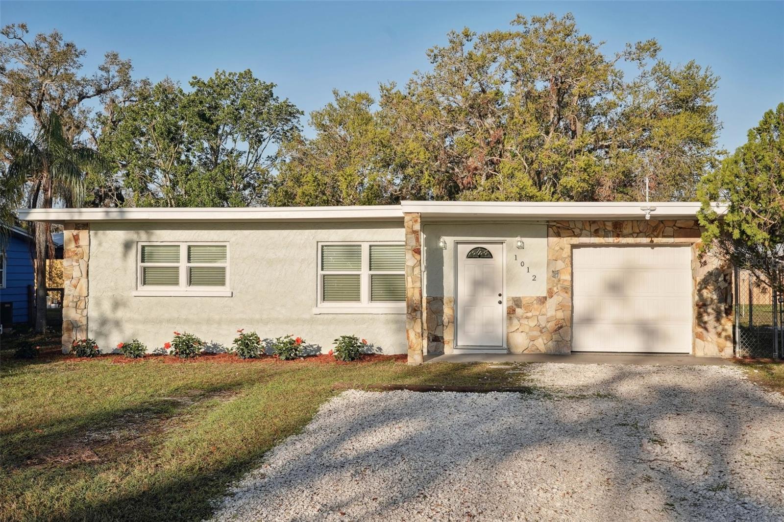 SELLER MOTIVATED! This sturdy block home boasts 3 inviting bedrooms and 2 spacious bathrooms, fully renovated. Equipped with a brand new roof, A/C unit and hurricane impact-rated windows, it’s all set for your peace of mind. A lovely residence that seamlessly merges comfort with classic Florida style with inviting curb appeal, you'll be greeted by a meticulously kept lawn and a delightful facade adorned with stone accents, creating a warm and welcoming first impression. This home is perfect for first-time homebuyers, downsizers, or anyone seeking a low-maintenance property in a fantastic location. Natural light streams through the windows, creating a cheerful and inviting atmosphere inside. This beautifully home features ceramic flooring installed throughout the entire property. The ceramic tiles, chosen for their durability and style, create a seamless flow from room to room, enhancing the sense of spaciousness and continuity. The bathrooms, with their modern fixtures and stylish decor, also benefit from the ceramic tiles, which add a touch of sophistication while ensuring ease of maintenance.
"Step into a modern, bright, and stylish kitchen that’s ready for you to make it your own! The stunning Quartz cream countertops are also complemented by ceramic tiles, making it easy to maintain and clean, and sleek cream cabinets create a clean and spacious feel. This kitchen features stainless steel appliances, modern hardware, and a beautiful gray backsplash that adds a touch of sophistication. With plenty of counter space and storage, it’s perfect for cooking and entertaining. The open layout ensures you'll never miss a moment with family and friends. Don't miss the opportunity to own this beautifully designed kitchen!" Enjoy the convenience of a private garage, perfect for parking or extra storage.
Situated in a desirable Oak Shores community!, you'll be close to everything that makes Florida living so enjoyable. Just a short walk or bike ride away from the renowned Pinecraft, this property presents a fantastic opportunity to dive into a lively and culturally vibrant neighborhood. For those who love the outdoors: - Enjoy easy access to the new Legacy Trail, perfect for: - Walking - Jogging - Cycling - All while surrounded by breathtaking natural beauty. Moreover, the location offers: - Swift access to: - Highly-rated schools - A wide range of dining options - Various shopping experiences - Trusted medical facilities - I-75 - Gorgeous beaches - A wealth of entertainment available. Step into a lifestyle that combines: - Convenience - Relaxation - Adventure This is an opportunity you don't want to overlook! - Schedule a showing today to invest in a future full of possibilities.