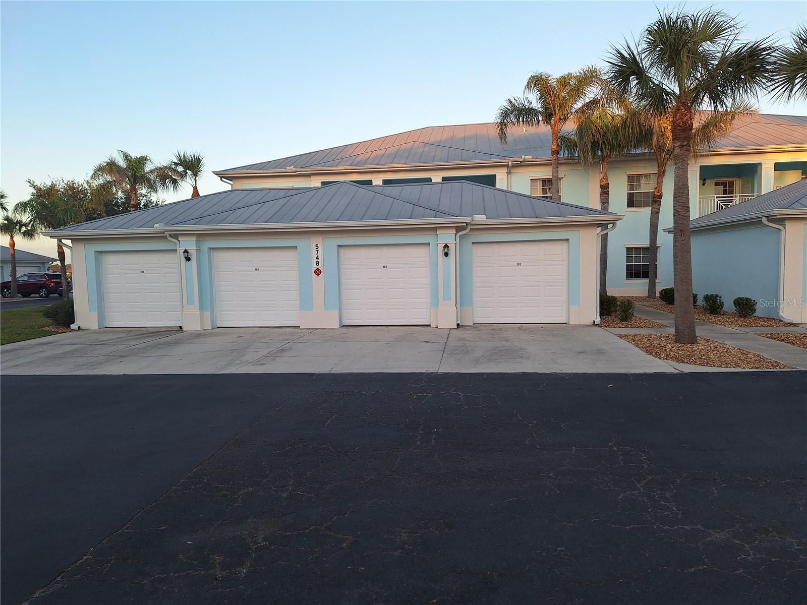 Short term rental, 3 to 4 months. Available July thru December. GROUND LEVEL 2 bedroom, 2 bathroom condo with 1 car garage. Located in the GATED COMMUNITY of The Colony at Sabal Trace. Beautifully updated condo throughout. Kitchen has granite countertops and stainless steel appliances. And a work station desk area with monitor in one of the closet pantries in the kitchen. Kitchen is open to the great room and has a water view through the sliding glass doors of the lanai. The separate dining room is located off the great room, close to the kitchen, and is equipped with a large Television. The master bathroom has a walk-in shower, while the guest bathroom has a tub/shower. The guest bedroom doubles as an office and has a hide-a-bed couch in it. Enjoy a cup of coffee or a glass of wine in the lanai as you take in the spectacular water view and watch the wall-mount TV! The single car garage has cabinets, workbench and shelves. The condo is fully turnkey furnished, just bring your suitcase! The clubhouse has tables for gathering/socializing as well as a kitchen. Down the hall in the clubhouse you will find the fitness room. Just outside the clubhouse is the heated swimming pool and large sundeck area. Only 15 minutes from Manasota Key Beach and several other beaches in Venice. Plenty of shopping and dining close by. No Pets allowed. Condo association approval is required before move in.