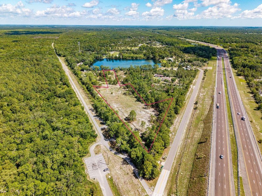 Waterfront 5.61 Acres – Buildable Recreational Land with Power Nearby. Blounts Ridge Rd, Mims, FL 32754.
Discover this rare 5.61-acre waterfront property in Mims, FL — recreational and buildable, with power available at the road and an impressive 1612.20 feet of road frontage on a paved, quiet street. Zoned for residential use, this lot offers the perfect opportunity to build a custom home, weekend retreat or long-term investment.
Located in a peaceful, rural area surrounded by nature, yet just minutes from I-95, Titusville, and Florida's Space Coast. Enjoy proximity to Kennedy Space Center, beaches, and outdoor recreation like boating, fishing, and wildlife viewing.
Property Highlights: 
5.61 acres of high and dry land,
Waterfront access for recreation,
Zoned residential, no HOA,
Power on Blounts Ridge Rd,
1612.20 ft of road frontage,
Quiet neighborhood with large lots and custom homes.
Don't miss your chance to own this versatile piece of Florida land. Build now or hold for the future — properties like this are disappearing fast! ALL INFORMATION FROM THE SELLER AND MUST BE VERIFIED BY THE BUYER!