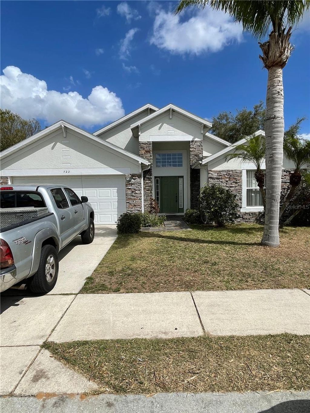 Photo of 722 Windsor Estates Drive, Davenport, FL 33837 (MLS # O6423749)