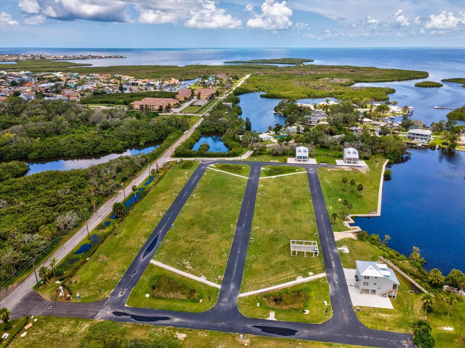 COTTAGES/OYSTER BAYOU TRACTS A - Land