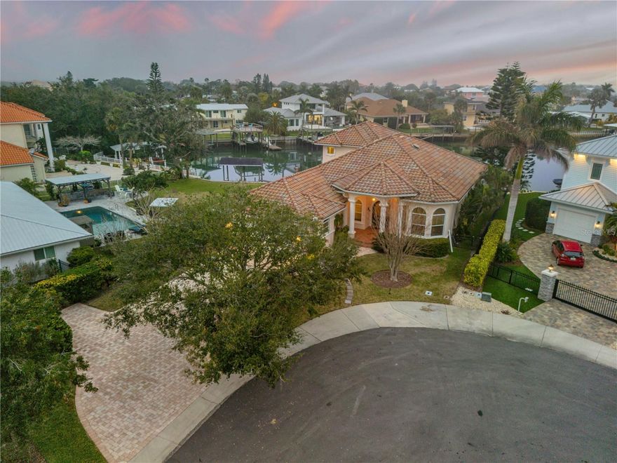 Located on the desired south side of Quay Assisi in the sought-after Venezia neighborhood of New Smyrna Beach, this exceptional waterfront property offers the ultimate in coastal living. Boasting 80 feet of prime waterfront directly off the Intracoastal Waterway, this home is a boater's and fisherman's dream with deep-water access for easy navigation and dockage. With 4 spacious bedrooms, 3 and a half bathrooms, and a dedicated office space, this home is designed for both comfort and luxury. The bright, open layout features expansive water views from nearly every room, inviting natural light to flood the living areas and creating a serene atmosphere.Perfect for outdoor living and entertaining, the property offers plenty of space to enjoy the stunning surroundings, whether you're relaxing on the deck or launching your boat from your private dock. Just a stone’s throw from Flagler Avenue’s vibrant shops, restaurants, and less than a mile to the beach, this location offers the best of both worlds: peaceful, waterfront tranquility and the excitement of New Smyrna Beach's lively coastal lifestyle. Don’t miss this rare opportunity to own a piece of paradise in one of the most desirable neighborhoods in New Smyrna Beach.