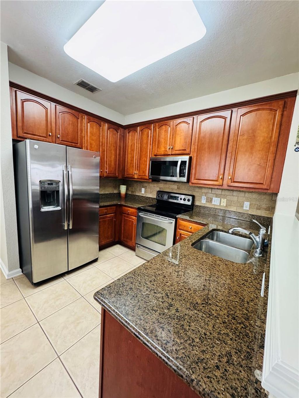 Photo of 6908 Sperone Street, Orlando, FL 32819 (MLS # O6383768)