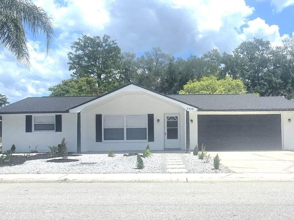 Photo of 7715 Cherrytree Lane, New Port Richey, FL 34653 (MLS # A4690665)