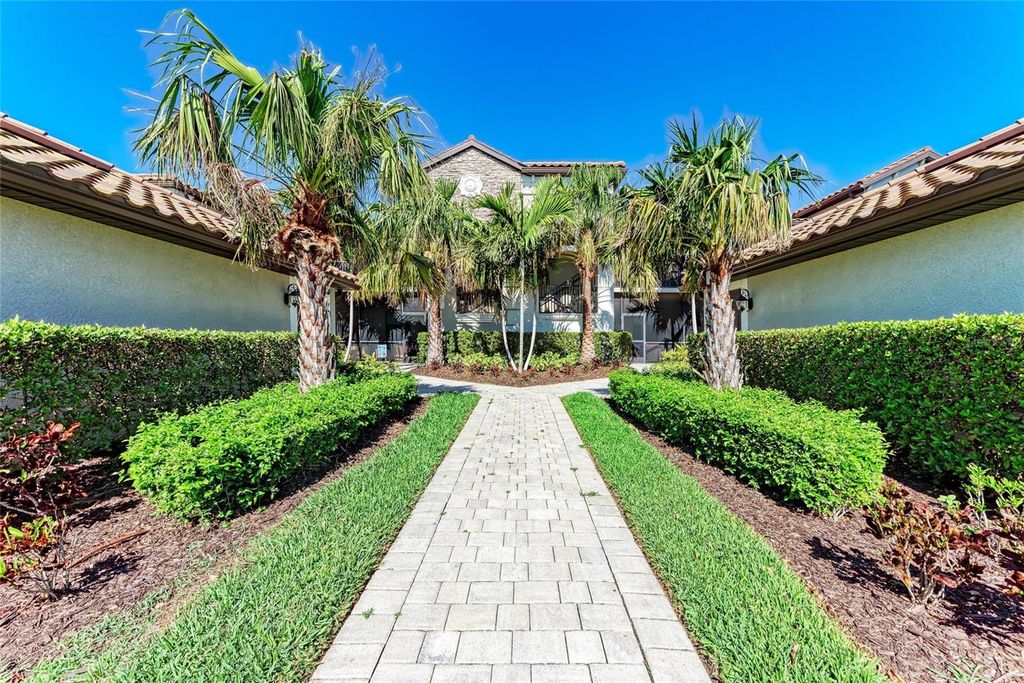 Photo of 5577 Palmer Circle #203, Bradenton, FL 34211 (MLS # A4644349)