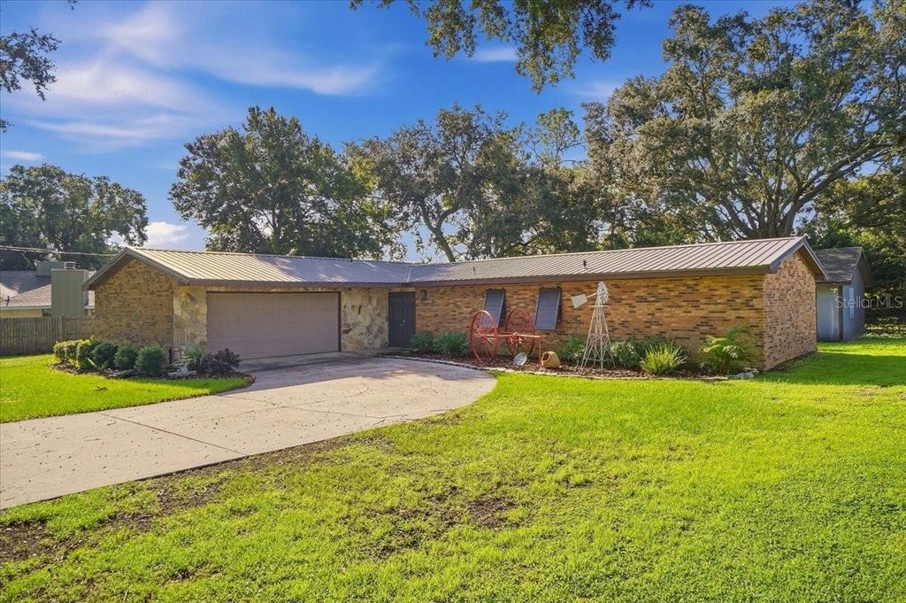 Photo of 611 E Highland Drive, Lakeland, FL 33813 (MLS # L4965151)