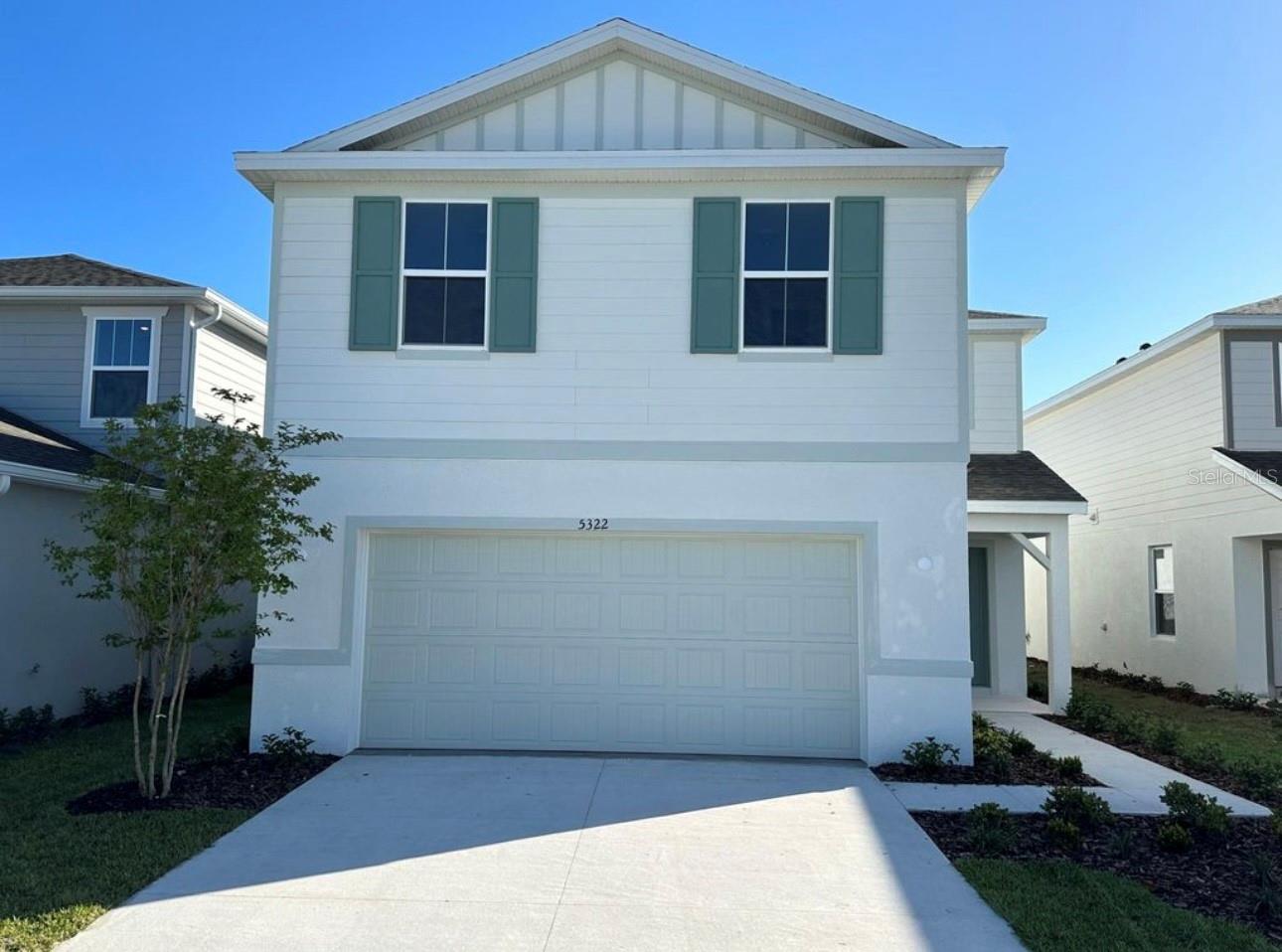 Welcome home to Cypress Hammock community! This new construction Tybee home design features 5bedrooms, 3bathrooms, a covered lanai, 2-car garage, The spacious gourmet kitchen opens to your cafe and gathering room and boasts an island, bright Lillian cabinetry with Satin Nickel hardware, Suite Arabesque porcelain tile backsplash, Majestic light granite countertops, built-in Whirlpool cooktop, pendant lighting pre-wiring and a large corner walk-in pantry. The covered lanai makes indoor and outdoor entertaining a breeze and overlooks the lake view beyond your backyard. Your Owner's Suite features a en suite bathroom with oversized walk-in closet, light Lillian cabinetry, granite countertops, dual sinks. Two additional bedrooms, the secondary bathroom and laundry room, on the opposite side of the home with convenience and privacy. This nice view lot provides the perfect space to kick back and relax with family and friends. Cypress Hammock offers affordable new homes in a nice neighborhood with attractions and a variety of shopping and dining just minutes away. Family-friendly amenities await, with innovative home designs, wetland views and private homesites. Enjoy the community pool with cabana, playground, covered picnic area! In addition, Cypress Hammock is zoned for highly ranked schools, located just off Hwy-192, nine miles to I-4 and less than 20 minutes away from Disney.