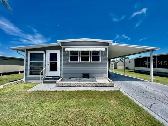WELCOME TO YOUR MARVELOUS HOME at 10826 Freedom Dr, Port Richey in the gated community of Senate Manor, a 55+ cooperative community in SUNNY Florida. This SUPERB 2 bedrooms, 2 bathroom single-wide manufactured home lies on a great lot with just over 4000 sqft in a NO CDD zone where there is NO LOT RENT! Key exterior features are covered carport parking, long driveway for parking of all your vehicles, rain gutters & easy-breezy TROPICAL landscaping that is taken care of for you. ENJOY the OPEN PATIO in the backyard or meet & greet your neighbors in your LOVELY front enclosed porch. When you step inside, you'll LOVE the OPEN FLOOR PLAN consisting of the Florida room, kitchen, living & dining rooms all dressed with ELEGANT water-resistant thick plank laminate floors throughout the home for fluidity of design. The WONDERFUL EAT-IN kitchen features a deep sink with gooseneck faucet, shaker-style cabinets with hardware, EXPANSIVE laminate counters & newer appliances including fridge, range & microwave. The SUPERB living room of DOUBLE-WIDE SPACE is HUGE so you can arrange your furniture in a multitude of ways. NATURAL SUNSHINE streams inside through the multiple DOUBLE-PANE, THERMAL TINTED, LOW E WINDOWS ILLUMINATING the interior together with the BRIGHT light fixtures. The primary bedroom features AMPLE closet space while the second bedroom is a comfortable space for your out-of-town visitors. The main bathroom features ceramic floors, updated vanity with PLENTY of storage & tub/shower combo. The second bathroom contains a step-in shower, vanity lights & storage options. The laundry room is located in the MASSIVE workshop space. The BRIGHT Florida room with double glass sliding doors into the living room is another AMAZING space which can function as a 3rd bedroom, office or casual get-together area. There is NOTHING to do in this home as it is TURN-KEY, MOVE-IN READY & FURNISHED. This home did sustain flooding from Hurricane Helene. The owner had it expertly remodeled using the services of a licensed contractor who pulled the proper county permits for the renovation. All permits have been closed out by the county with a final inspection & the mobile passed county inspection. This AMAZING home is better than it ever was before & ready for immediate enjoyment! Senate Manor is a WONDEFUL 55+ COMMUNITY & included in the low HOA fee of $200/month is trash with recycling pick-up 2X week, all exterior lawn maintenance, water, sewer, street lights, water with fountain views, gates & recreational activities like HEATED POOL & SPA, shuffleboard, horseshoes & gym. There is optional storage for boats, RVs or trailers on site. Location is IDEAL near beaches, shopping, restaurants, medical plazas, places of worship & tourist attractions. MAKE THIS YOUR FUTURE HOME!