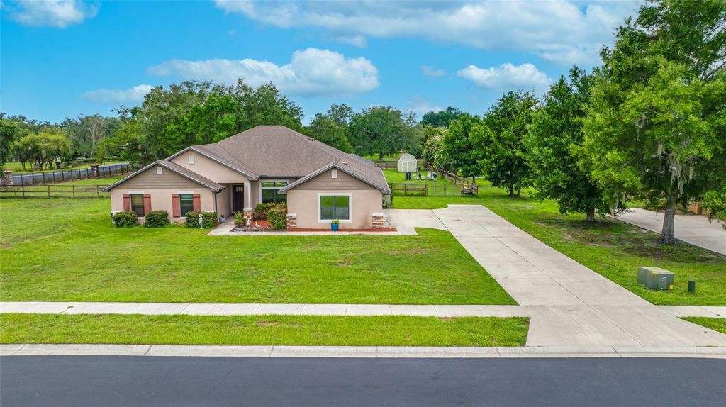 Photo of 14311 Hill Country Lane, Dade City, FL 33525 (MLS # TB8522598)