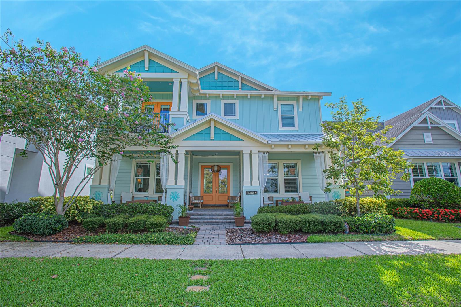 Welcome to Your Private Oasis of Beauty and Serenity!
Discover this stunning two-story retreat, offering FIVE bedrooms, THREE-and-a-half baths, and over 3,200 square feet of thoughtfully designed living space. Every detail of this home blends modern luxury with everyday comfort.  A tranquil western WATER VIEW and a two car rear loading garage set the stage for relaxed Florida living. Enjoy the beautifully manicured yard and take in the peaceful surroundings from the charming front porch—perfect for watching the sun set over picturesque Square Lake each evening.
Inside, a bright and contemporary interior welcomes you with soaring ceilings, warm wood flooring, and an open, inviting layout. The designer kitchen is a true showpiece for culinary enthusiasts, featuring a gourmet feel with DOUBLE OVENS, expansive granite countertops, a stylish tiled backsplash, a central island with seating, and abundant cabinetry for all your storage needs. The adjoining dining and family rooms create the perfect gathering space for entertaining or simply enjoying time together.
On the main floor, you’ll also find a versatile GUEST SUITE with a private bath, a spacious HOME OFFICE with a generous closet, a formal dining/flex space, and a convenient powder room.
Upstairs, the LOFT provides a FLEXIBLE SPACE ideal for a media room, play area, or relaxation zone. The owner’s suite is a true sanctuary—complete with a PRIVATE BALCONY where you can unwind while gazing at the moonlight dancing on the water. The spa-inspired ensuite bath offers dual sinks, a soaking tub, a beautifully tiled shower with glass doors, and an EXPANSIVE walk-in CLOSET.  Three additional bedrooms and a well-appointed bath are perfect for family or guests, and a second-floor laundry room adds convenience to your daily routine.
Every corner of this home features thoughtful upgrades, including plantation shutters, French doors, 10-foot ceilings, recessed lighting, wood soffits, and elegant quartz countertops.
Step outside to your COVERED LANAI with a charming paver deck—an inviting space to enjoy OUTDOOR FLORIDA LIVING. Watch your favorite shows on the outdoor big screen or design a dream summer kitchen for effortless entertaining and barbecues.
Built by Minto, this Mansfield floor plan exemplifies livability, craftsmanship, and style. Located in the highly desirable Laureate Park community, residents enjoy resort-style amenities including parks, nature trails, tennis courts, popular schools, biking and walking paths, and an aquatic center featuring two resort pools and a lap pool.
Look no further, as this home fulfills every aspect of your dream lifestyle. Schedule your private tour today and experience this exceptional home for yourself!