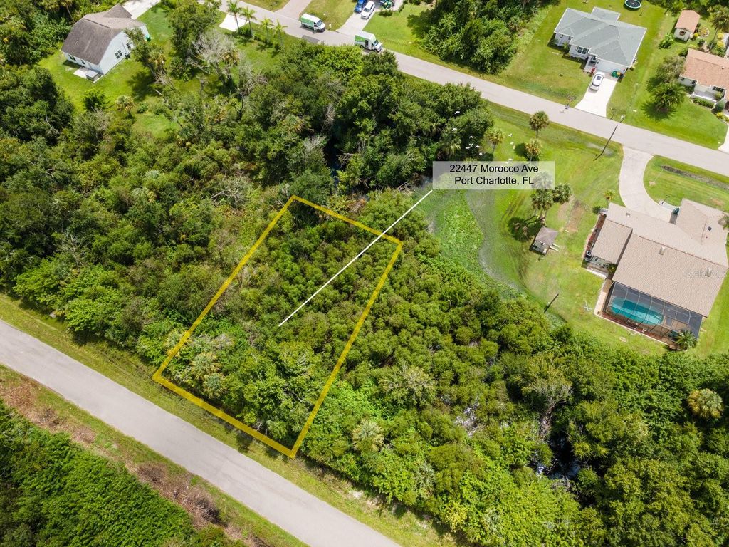 Photo of 22447 Morocco Avenue, Port Charlotte, FL 33952 (MLS # C7497523)