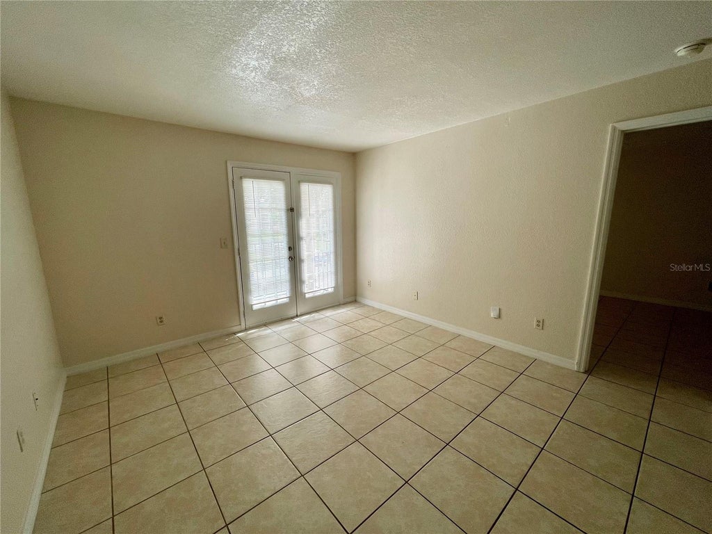 Photo of 2550 N Alafaya Trail #10202, Orlando, FL 32826 (MLS # O6444515)