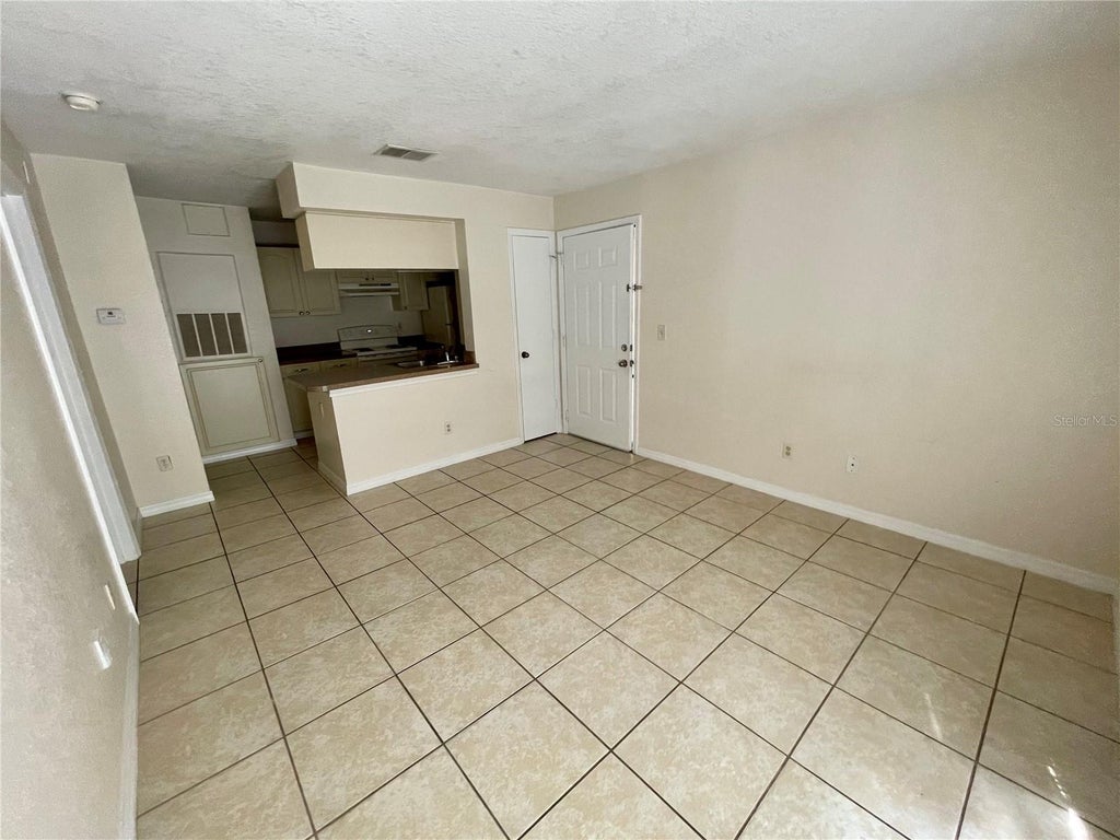 Photo of 2550 N Alafaya Trail #10202, Orlando, FL 32826 (MLS # O6444515)