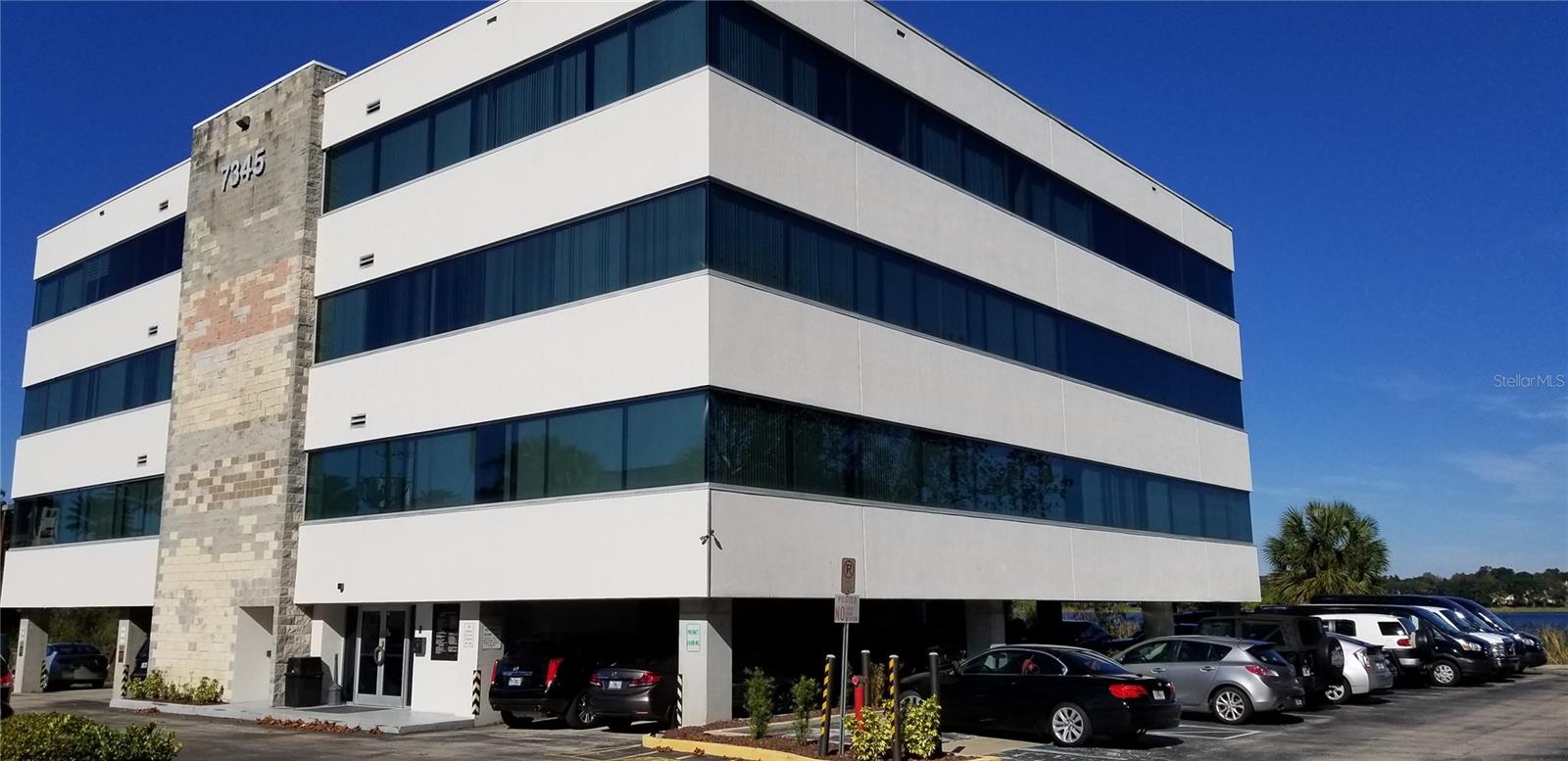 Location, Location, Location. In the heart of Dr Phillips, AFFORDABLE Amazing office space available for lease now. Single office unit, located on the 4th Floor ( top floor ), with views of the bustling Sand Lake Rd and Big Sand Lake. Hardwood flooring throughout, large windows bring in great natural light. Suitable for multiple business purposes. Luxury office building, parking on site. Located walking distance to the famous Restaurant Row, and near major highways makes it easily accessible. This will not last long, call now to schedule your showing. Buyer/Buyers agent responsible to verify all information in listing is correct.