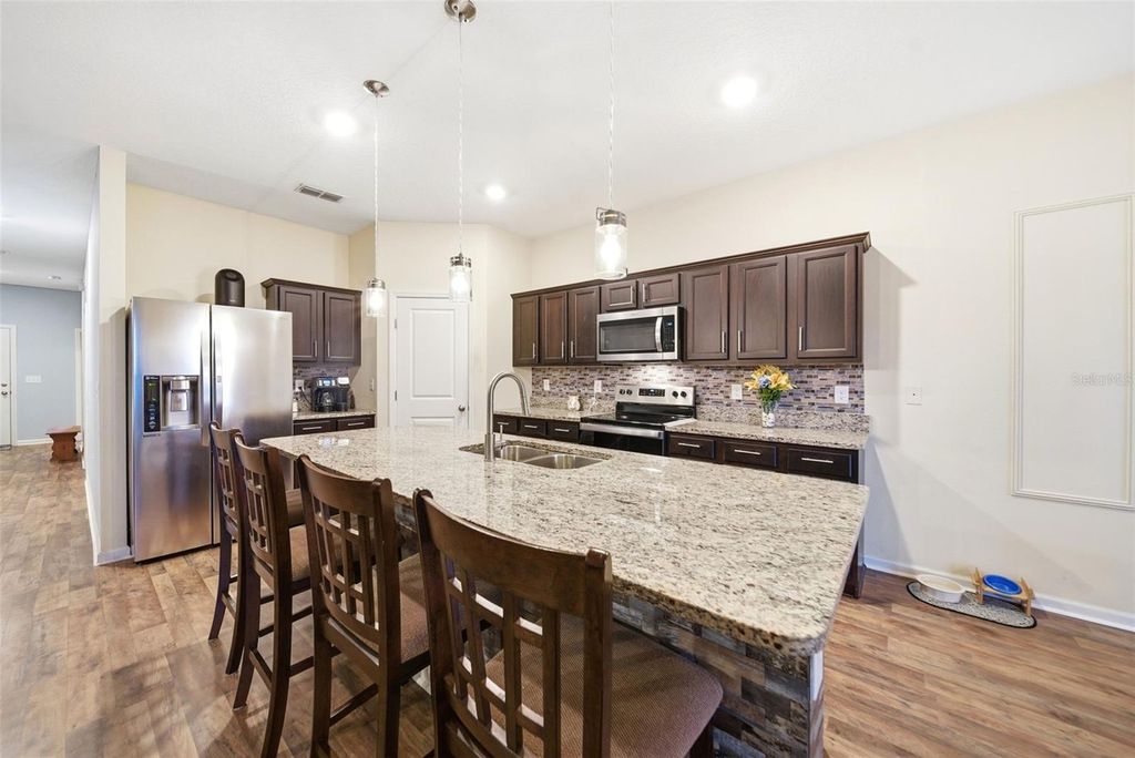 Photo of 1151 Lycaste Drive, Davenport, FL 33837 (MLS # O6382354)