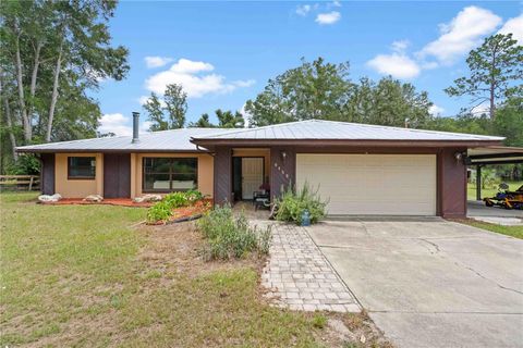 Photo of 9459 N Eubanks Terrace, Dunnellon, FL 34433 (MLS # OM727502)