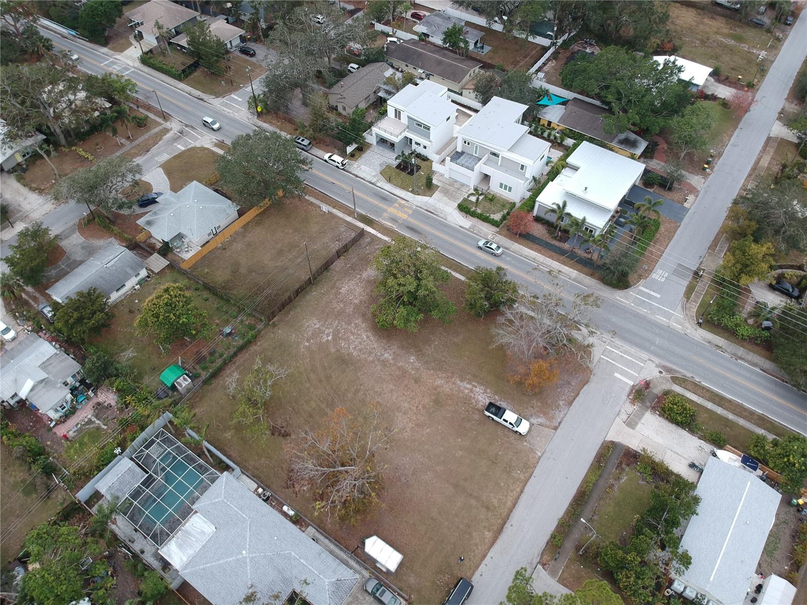 Presenting: a RARE and UNIQUE opportunity in the heart of BEAUTIFUL Sarasota!!
** NOTE: Must be purchased together with two other lots: MLS#s A4637360 AND A4637407 for a total of 3 connected buildable lots (total asking price for all three is $1.5M) -- a developer’s dream to build 3 homes OR Custom build your own beautiful home on nearly a Half Acre! Very few vacant buildable lots left! This neighborhood has no HOA and you have plenty of room here to include a swimming pool and/or build a guest house ensuring privacy and space. The possibilities are ENDLESS! Electricity and water are ready to hook up. This lot is close proximity to bustling Downtown Sarasota...boasting a fantastic nightlife and bayfront where you can enjoy everything from world class dining, movies, dancing, music, and the Farmer's Market every Saturday! Just beyond that to the West you have shopping and fine dining options on St. Armands Circle and then out to Lido Key for beautiful sunsets or a nice stroll on the beach. To the North you have Longboat Key and Anna Maria Island. Or head just a little to the South and enjoy the WORLD-FAMOUS SIESTA KEY!! Only 5 blocks from Publix, 5 blocks to Payne Park (dog park/playground/skatepark/running trail), and 1.2 miles to the Sarasota Bayfront aka Island Park and Marina Jack's... Add Island Park and Ringling Bridge to your exercise routine as it offers a walking path all along the bayfront. Marina Jack's is a full-service marina offering boat and jet ski rentals as well as fishing/diving charters and large boat dockage (fees apply) with electricity and water available. Marina Jacks Restaurant offers fine dining with a breathtaking waterfront view. Other areas of interest: Only 2 blocks to the Legacy Hike/Bike Trail, 1.3 miles to Sarasota Memorial Hospital and Southside Village which offers even more shopping and several fine boutique style dining options as well as Morton's Gourmet Market. If you head North 5.6 miles you will find the beautiful Ringling Museum and the historic "Ca d'zan" Mansion open to the public as well as the SRQ International Airport. To the East about 8.7 miles, you will find our new mall at University Town Center (UTC) with more restaurants and shopping than you can ever imagine! To enjoy the beaches you will head West 4.9 miles Lido Beach or South 6.9 miles to Siesta Key Beach. And if you like theme parks, you'll find Busch Gardens approx. 50 miles away, Disney and Universal Studios, SeaWorld and MORE approx. 100 miles away! Come experience the Florida lifestyle this premium location offers in the beautiful town of Sarasota!