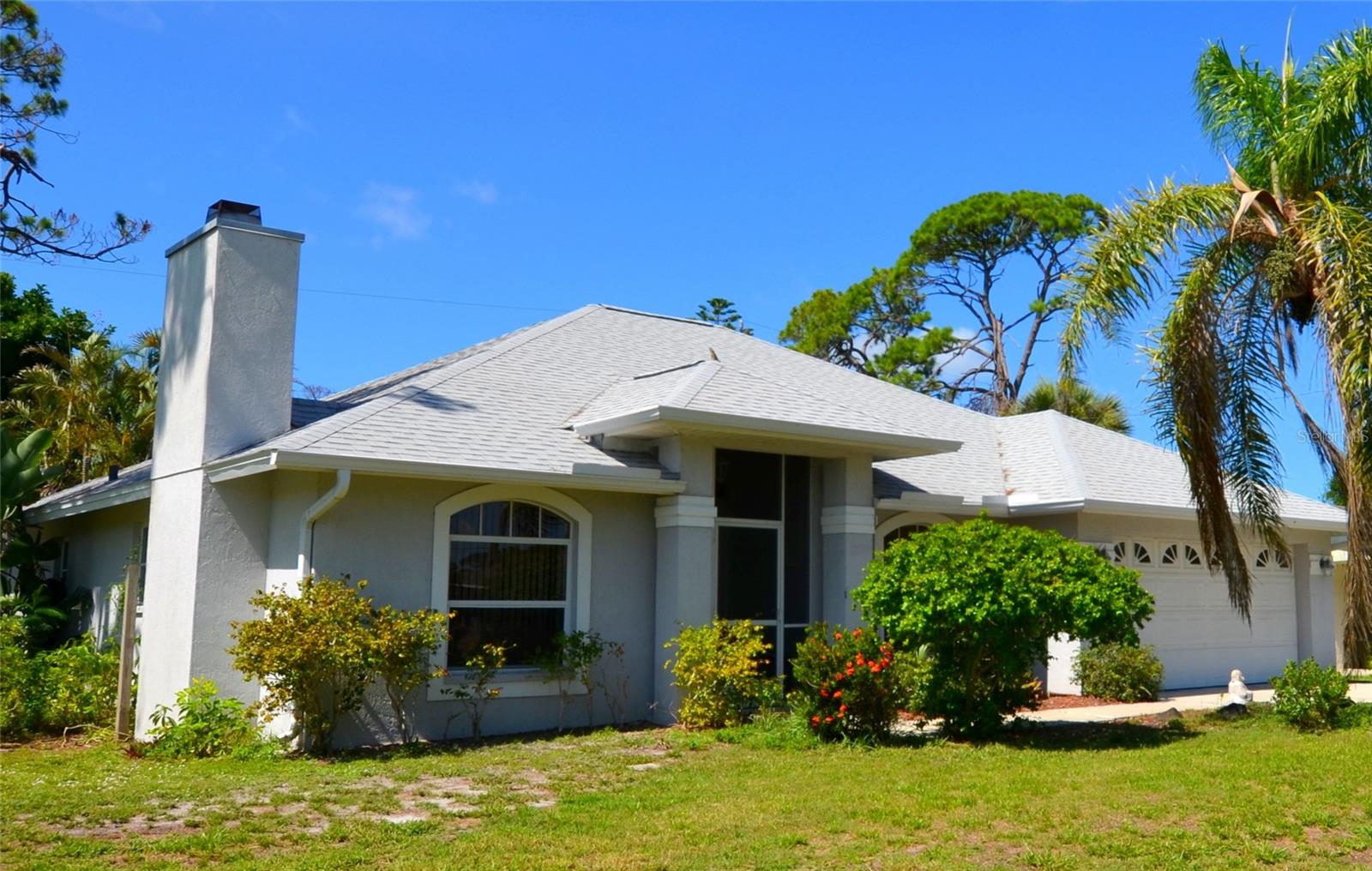 Welcome to Your Florida Retreat – Just Three Miles from North Manasota Beach!
Nestled in a serene and friendly neighborhood, this charming Fireside Home offers a perfect blend of comfort, character, and convenience. Featuring three bedrooms and two bathrooms, the home is thoughtfully designed to suit both full-time living and seasonal getaways.
Step into the formal living room, where a cozy wood-burning fireplace creates a warm, spacious ambiance. The family room features vaulted ceilings and opens to a large screened lanai—complete with a relaxing spa—providing the ideal setting for outdoor entertaining or peaceful evenings.
Situated on a generous lot, the property offers potential for future additions such as a studio or detached garage. Located just two miles from the South Venice Beach Ferry and Community Center (voluntary membership available) and in close proximity to shopping, schools, and the local library, you'll enjoy both tranquility and convenience.
Recent updates include a new roof installed in 2023.