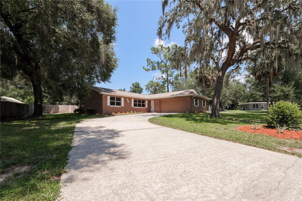 Photo of 34691 Orchid Parkway, Dade City, FL 33523 (MLS # O6435348)