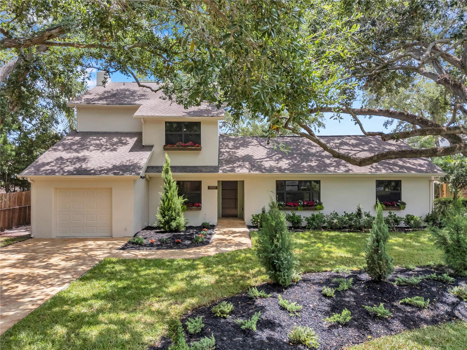 Stunningly renovated 4-bedroom, 3-bath home with 3,291 sq. ft. of luxury living on a quarter-acre in sought-after South Tampa.
Step inside to an open-concept floor plan with expansive living and dining areas, wide-plank flooring, and abundant natural light through newer impact-rated Low-E windows. The designer kitchen features custom wood cabinetry, quartz countertops, stainless steel appliances, and a large island—perfect for entertaining.
The spa-inspired primary suite offers a freestanding soaking tub, double vanities, and a walk-in shower with designer tile. Two additional stylish bathrooms and spacious guest rooms make this home perfect for family and guests.
Outside, enjoy a huge screened-in pool, all-new landscaping and sod, and a brand-new driveway with fresh curb appeal. A brand-new roof featuring sleek black shingles for a modern finish and added peace of mind.
Located just minutes to downtown Tampa, shopping, dining, and major highways, 3 minutes away from Kenneth E. Adum K-8 Magnet School, and 4 minutes from Mabry Elementary. This home is move-in ready and ideal for buyers seeking luxury, comfort, and indoor-outdoor living.