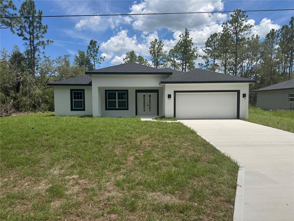 Photo of 142 W Diego Place, Citrus Springs, FL 34434 (MLS # O6319655)