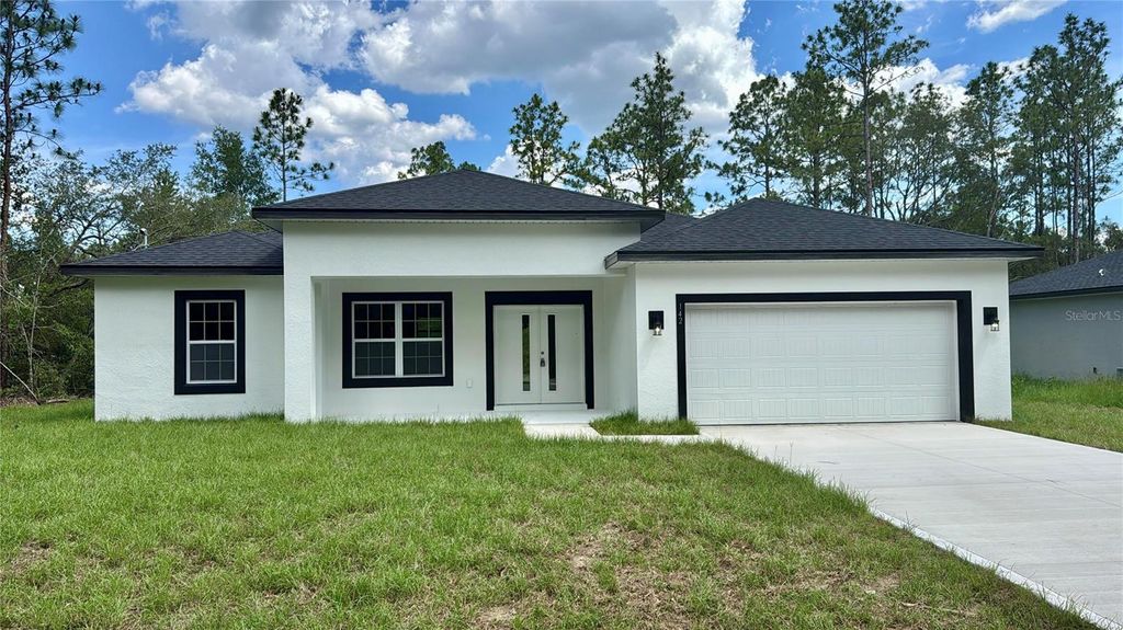 Photo of 142 W Diego Place, Citrus Springs, FL 34434 (MLS # O6319655)