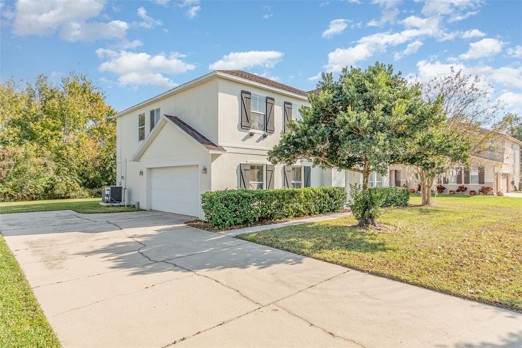 Photo of 413 Country Cottage Lane, Winter Garden, FL 34787 (MLS # O6365416)