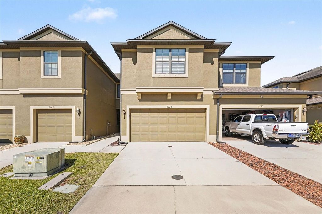 Photo of 5128 Bay Isle Circle, Clearwater, FL 33760 (MLS # TB8475611)