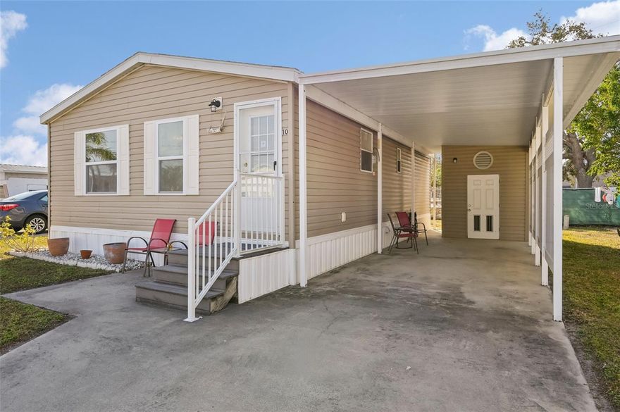 Welcome to Royal Garden Estates, your gateway to Anna Maria Island! NOT LOT RENT! This home is less than 5 MILES to the beach and NOT IN A FLOOD ZONE! This is the perfect opportunity to combine your love for the beach with a location with less worries! In addition to its proximity to the beach, the community is also adjacent to a large shopping plaza, including Winn Dixie, Starbucks, and First Watch! Oh, and the best part is that this home was built in 2010 and is the newest home in this park! The newer homes were built to higher standards, and are insurable! Just when you think it can’t get any better, you can’t live much cheaper, with a maintenance fee of ONLY $133 PER MONTH! The floor plan of this home is quite charming, with the kitchen, dining room, and living room flowing together into one large living space. The ceilings are vaulted, making the home feel even larger than it is! There is a laundry closet inside - no need to go outside to do laundry! The guest bedroom is spacious, and the master suite features an ensuite bathroom. Outside you’ll find a carport with an additional storage shed. The home is being sold mostly furnished, so what else are you waiting for? Schedule your showing today!