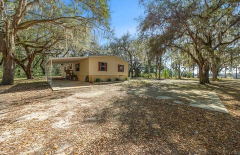 Photo of 5590 E Highway 316, Citra, FL 32113 (MLS # OM720347)