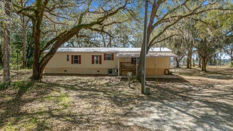 Photo of 5590 E Highway 316, Citra, FL 32113 (MLS # OM720347)