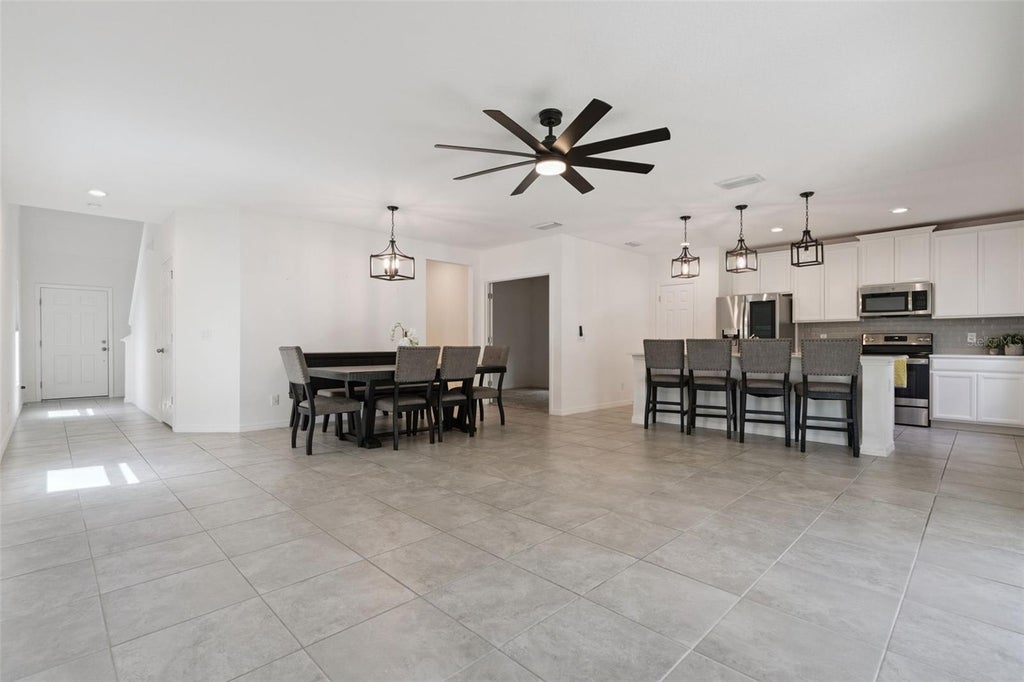Photo of 809 Marcel Loop, Davenport, FL 33837 (MLS # O6433655)