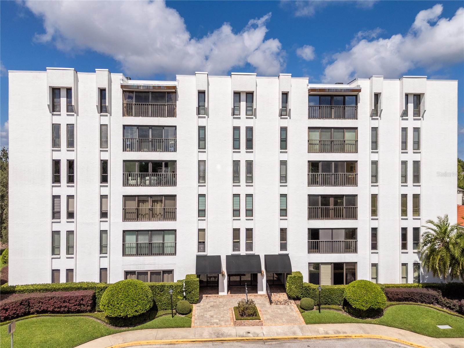 RARE CORNER TOP-FLOOR CONDO WITH AMAZING VIEWS – FULLY FURNISHED AND IN THE HEART OF WINTER PARK!
Discover the perfect blend of comfort, style, and unbeatable location! This beautifully maintained 2-bedroom, 2-bath corner unit sits on the top floor of the desirable Villages of Winterset, offering expansive views and abundant natural light throughout.
Enjoy the convenience of two elevators, a private storage unit on the same floor, and on-site laundry just steps from your door. Your assigned covered parking keeps your car cool and protected, and the secured mid-rise building features key access, a call box for guests, and a welcoming lobby lounge.
Step outside and you’re just a short walk to everything that makes Winter Park special — Park Avenue’s boutique shops and restaurants, Rollins College, the Morse Museum, Winter Park Golf Course, and the SunRail station. Central Park is right there for art festivals, concerts, and weekend strolls!
Relax at home by the sparkling community pool, enjoy the sun deck or BBQ area, and soak in the charm of one of Winter Park’s most beloved communities. Winterset is owner-occupied only, where rentals and pets are not permitted ensuring peace, privacy, and pride of ownership all around.
Come see why homes at Winterset rarely hit the market — and fall in love with your new Winter Park lifestyle!