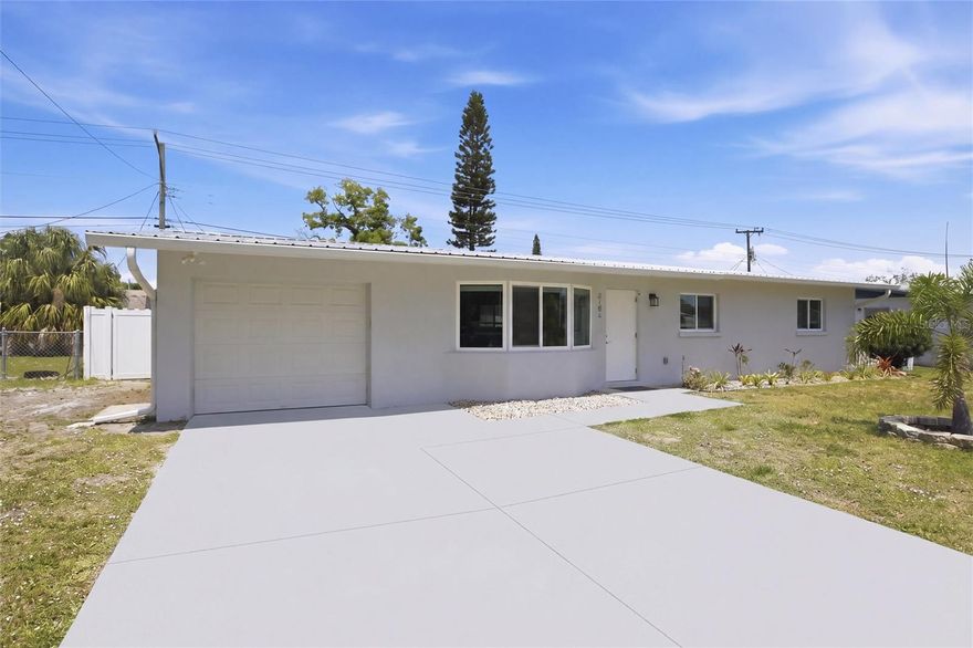 Welcome to this beautifully updated ranch offering comfort, functionality, and Florida-style outdoor living. This 3-bedroom home features an open floor plan with ceramic tile flooring throughout, complemented by recessed lighting and ceiling fans in every room for year-round comfort. The kitchen is thoughtfully designed with stainless steel appliances, a wall oven, electric cooktop, quiet-close cabinetry, and a convenient reach-in pantry. It flows seamlessly into the living and dining areas, creating an ideal space for both everyday living and entertaining. The primary suite offers peaceful backyard views and includes a well-appointed three-quarter en suite with granite countertops and modern finishes. All bedrooms feature closet organizing systems for efficient storage. The secondary bathroom has been tastefully updated with granite countertops, a new vanity, upgraded lighting, a lighted mirror, a tiled shower, and a timed exhaust fan. Additional highlights include hurricane impact windows, an HVAC system approximately five years old, an updated water heater, fresh interior paint, and an automatic garage door opener with a one-car garage. Step outside to a private screened lanai featuring a pool and sealed patio floor, perfect for relaxing or entertaining. The partially turfed backyard provides a low-maintenance space ideal for gardening or outdoor enjoyment. This move-in ready home combines thoughtful updates, practical features, and inviting outdoor space—ready for its next owner to enjoy.