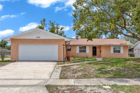 Photo of 4992 E Wind Street, Orlando, FL 32812 (MLS # O6411883)