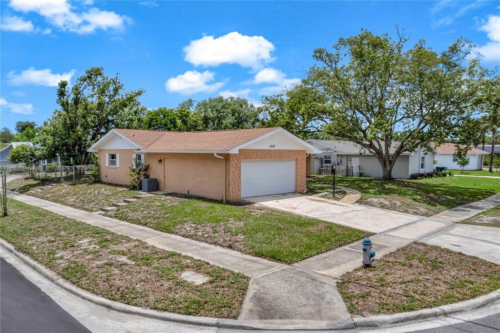 Photo of 4992 E Wind Street, Orlando, FL 32812 (MLS # O6411883)